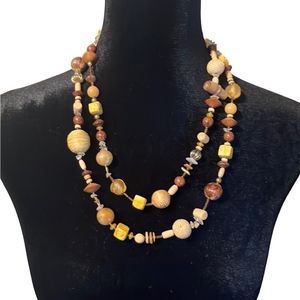 Double or single stranded wooden, stone and beaded necklace. Perfect condition.